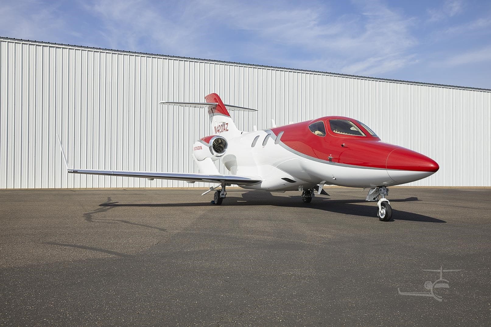 Red and white HondaJet N420AZ available for dry lease in Fort Lauderdale